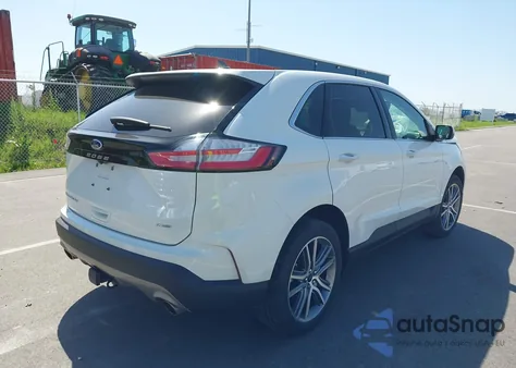 2023 Ford Edge Titanium z USA, uszkodzony, nr VIN 2FMPK4K97PBA54525